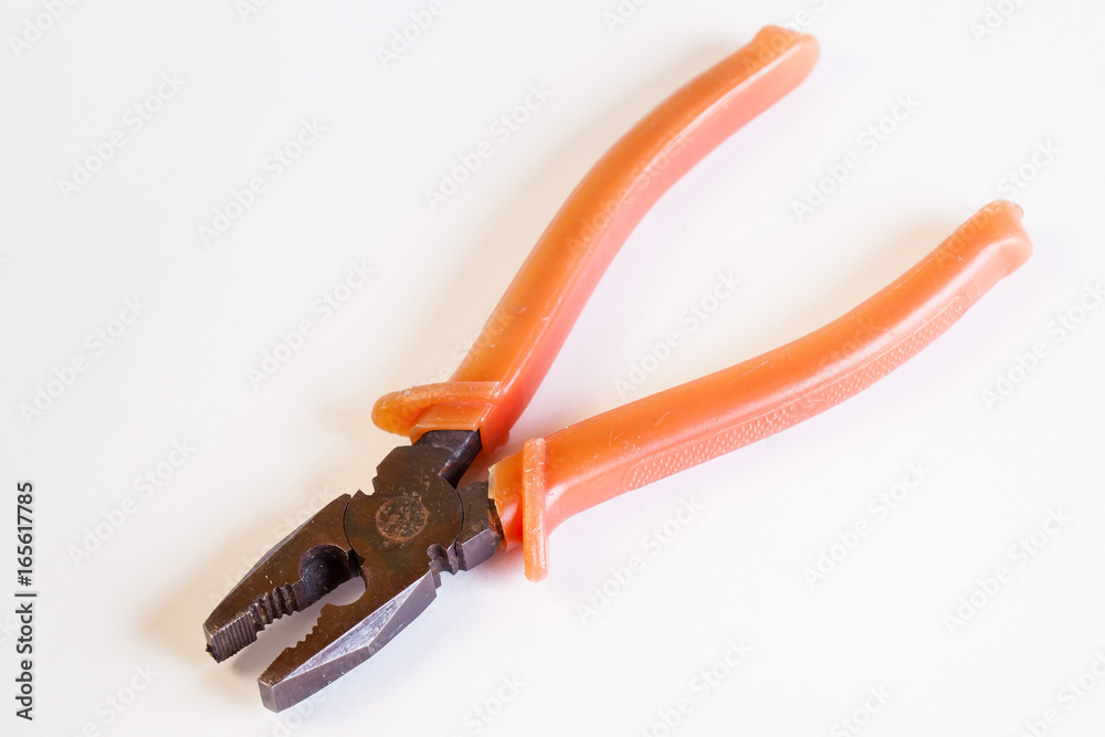 Old pliers on white background. Hand tool household. Old pliers on white background. Hand tool household.