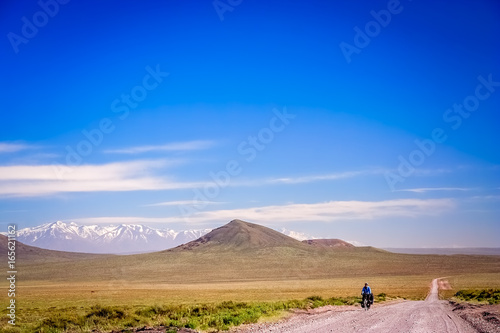 Woman cycling on the famous Ruta Quarenta photo