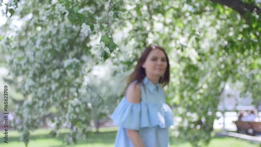 beautiful girl in a dress with a apple at the apple tree beautiful girl in a dress with a apple at the apple tree
