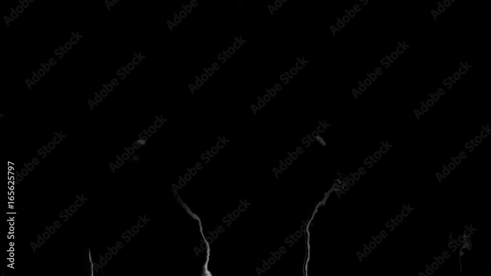 Black ink flowing on white background