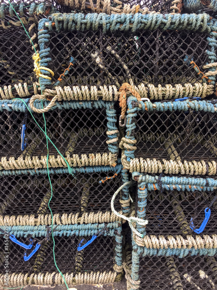Fishing pots piled on the dock