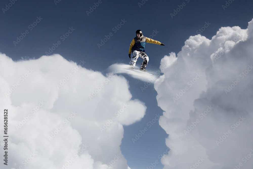 Snowboarder making jump