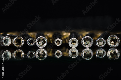 View Into the Barrel of a Row of Antique Pocket Watch Keys