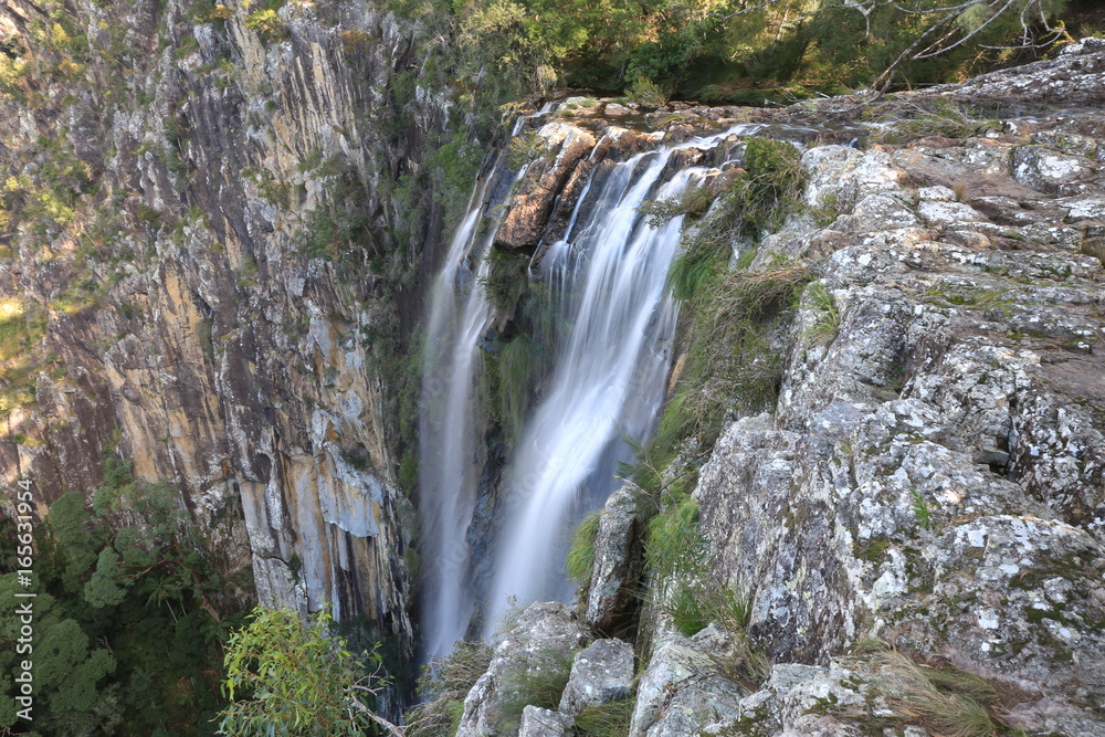 A slow shutter of the waterfall at Minyon Falls near Byron Bay in NSW Australia.