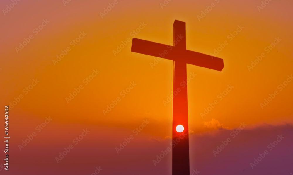 Cross over beautiful sunset background with Copy Space