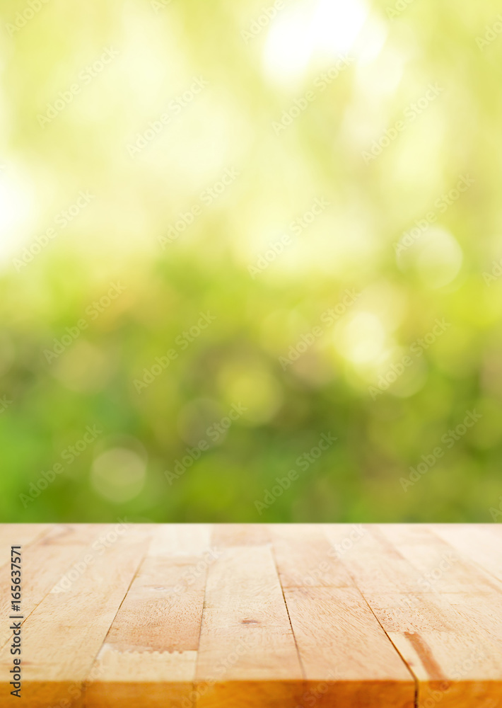 Wood table top on abstract bokeh background Wood table top on abstract bokeh background