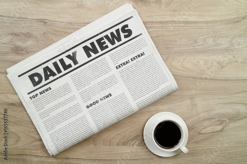 Top view mockup newspaper and coffee on wood desk.