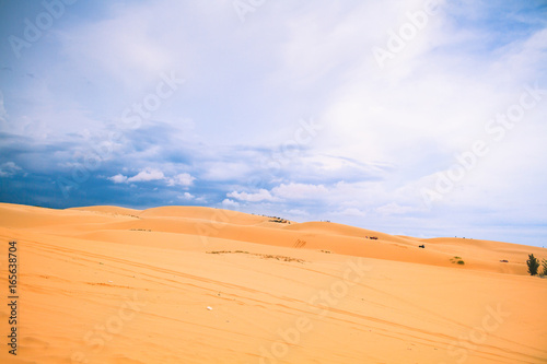 White Desert At Mui Ne / Sunny Day With Blue Sky And Clouds On Sand Dune (White Desert) At Mui Ne Vietnam.