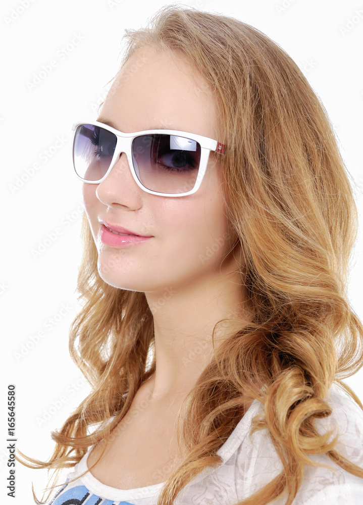 Beauty portrait of beautiful woman with stylish hairstyle in sunglasses Beauty portrait of beautiful woman with stylish hairstyle in sunglasses
