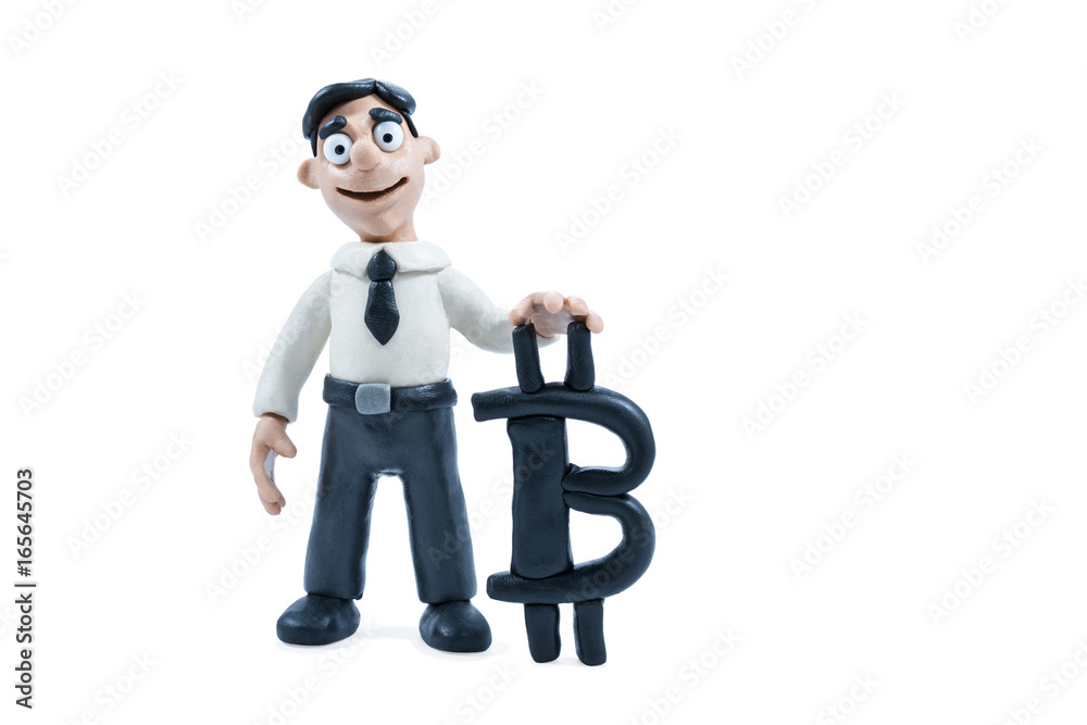 Plasticine businessman in shirt and tie next to plasticine bitcoin sign isolated on white background Plasticine businessman in shirt and tie next to plasticine bitcoin sign isolated on white background