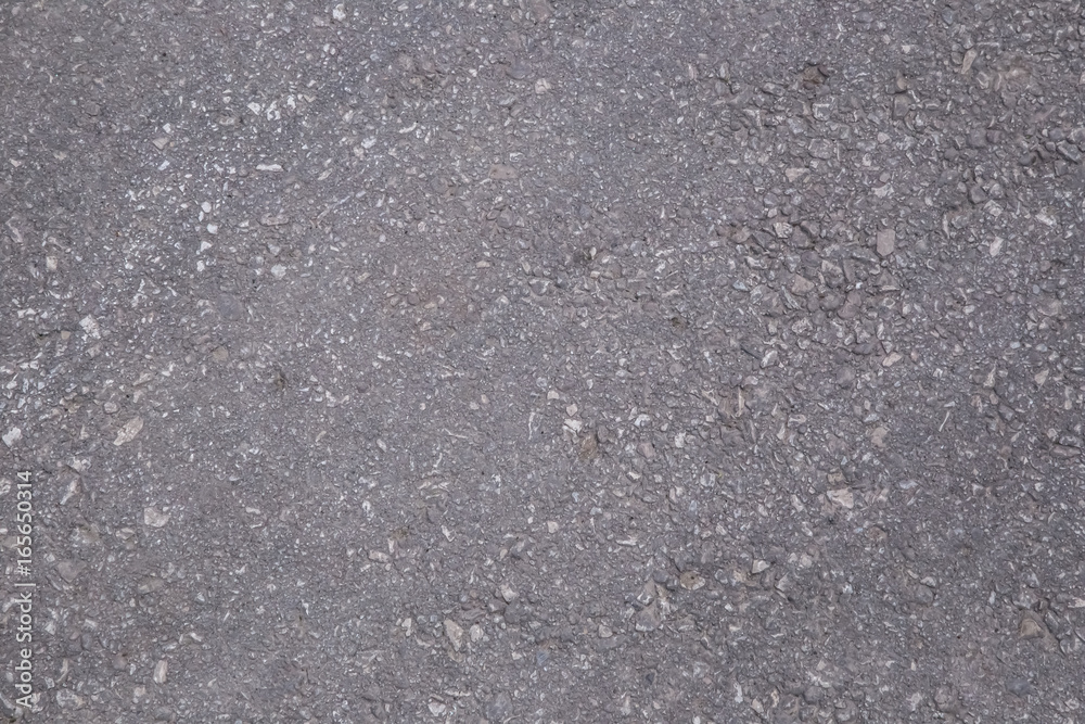 Premium Photo  Smooth dark grey asphalt pavement texture background with  small rocks
