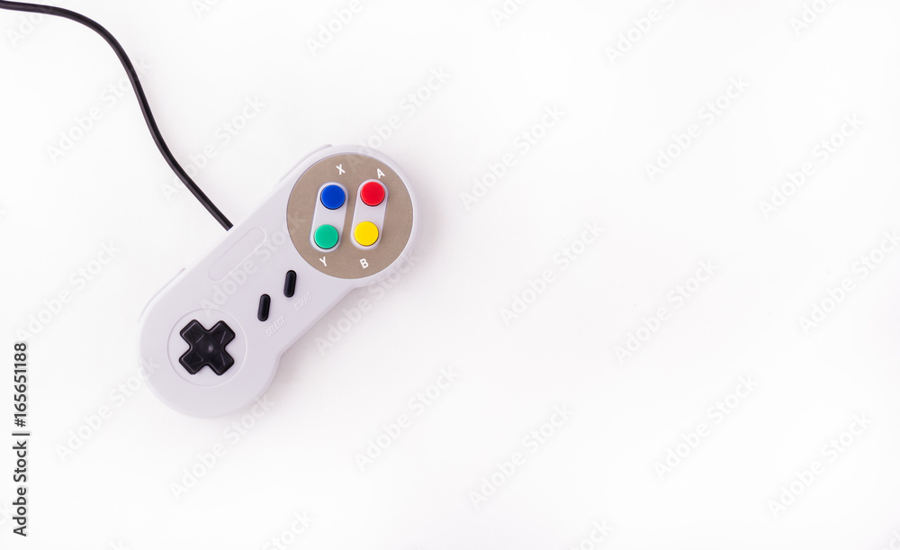 Gray retro joystick on a white background. Video game console GamePad on a white background. Top view