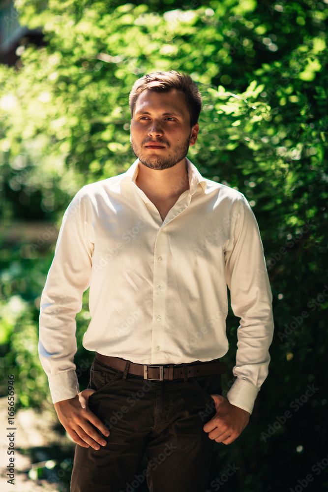 Handsome young man on nature background Handsome young man on nature background