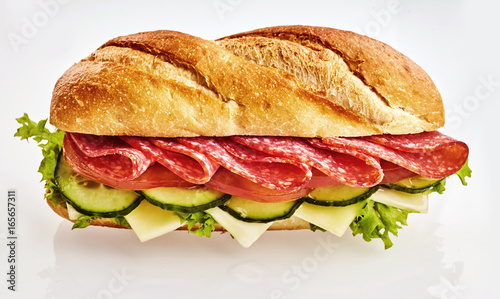 Baguette with salami, cheese and vegetables