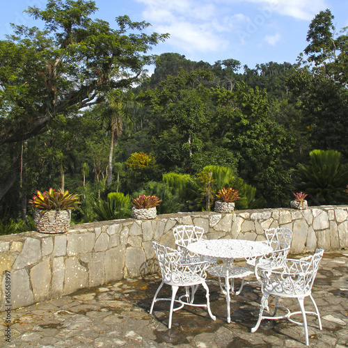  Sierra del Rosario  biosphere reserve  Soroa  Cuba. Terrace with vintage chairs
