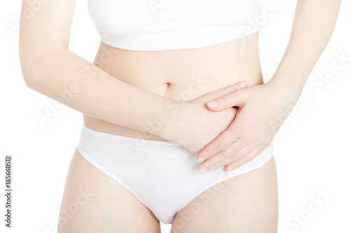 Woman with abdominal pain isolated on white, clipping path © andersphoto