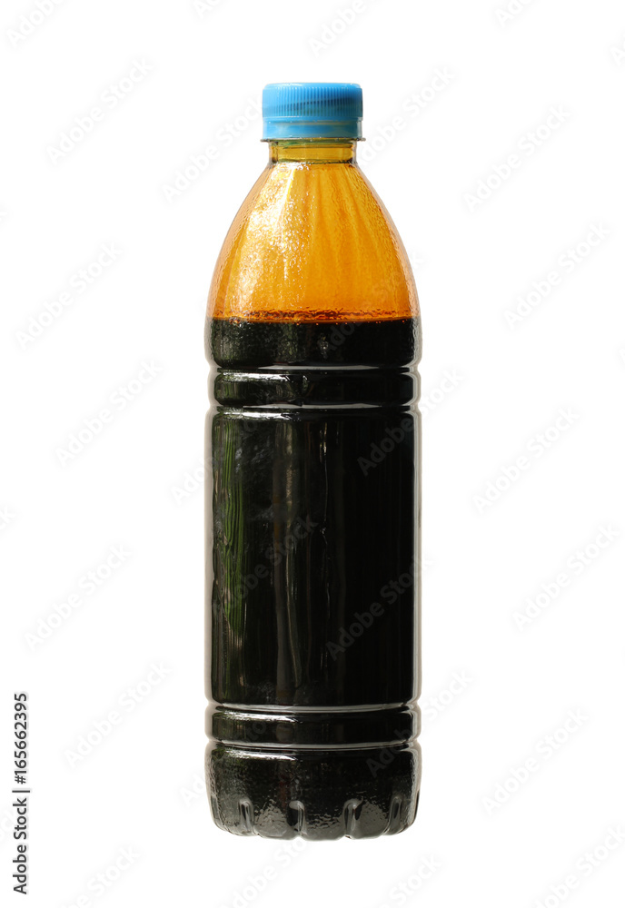 Dirty motor oil in bottle isolated on white background Dirty motor oil in bottle isolated on white background