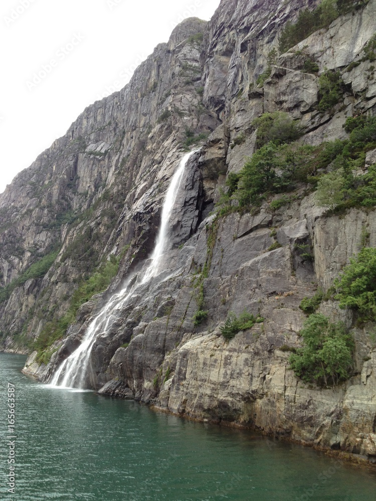 Waterfall in to the Norwegian fjord