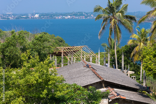 House in the Jungle. View from the Japanese Peace Pagoda to direction Galle with the natural harbor. Seen from the platform on top of the Rumassala hill in Unawatuna