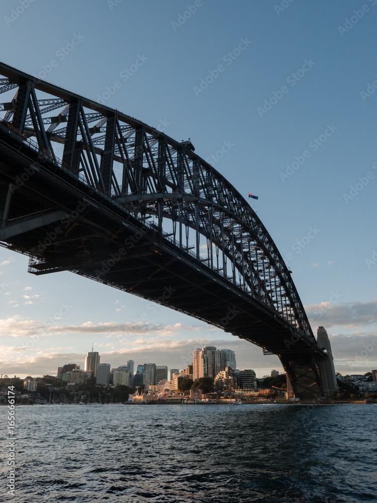 Fototapeta premium Iconinc Sydney Harbour Bridge in a sunset time.