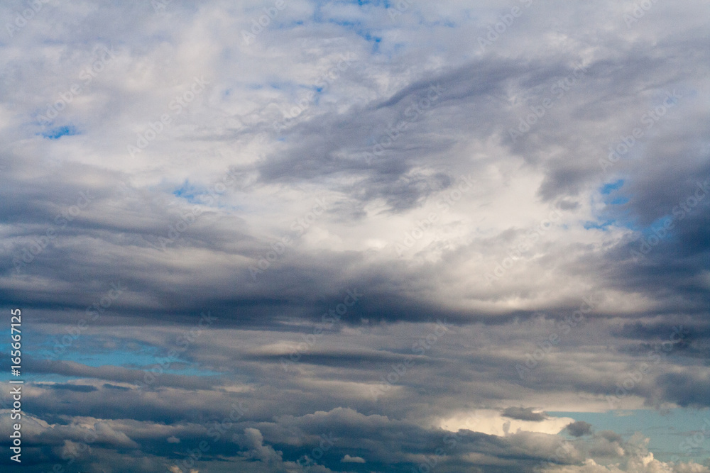 Blue sky with gray and white clouds. cumulonimbus. background, nature. Blue sky with gray and white clouds. cumulonimbus. background, nature.