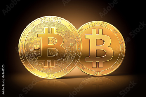 Two different golden bitcoins as possible split of bitcoin cryptocurrency into two currencies. Bitcoin fork concept. photo