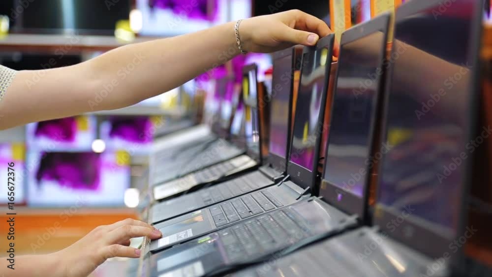 choose a laptop in the shop of digital technology choose a laptop in the shop of digital technology