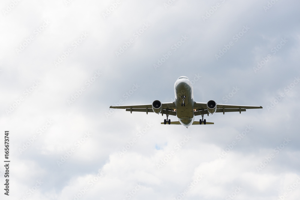 Passenger airplane in the clouds