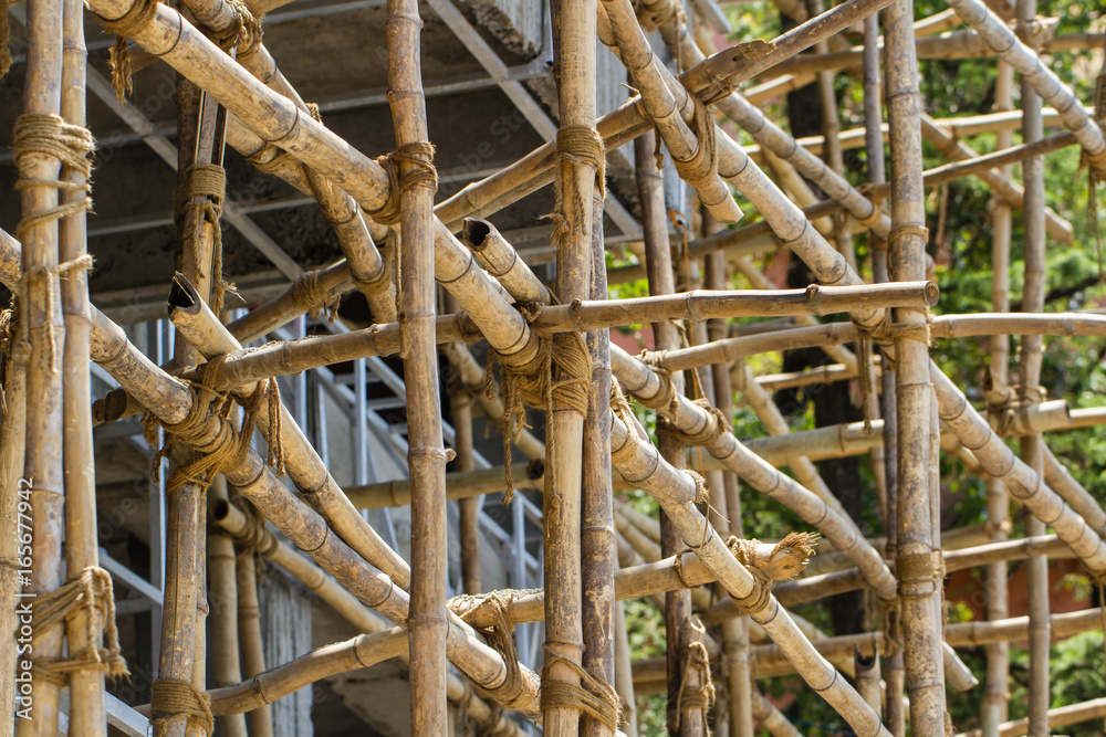 Scaffolding from bamboo. Typical Construction Site in Asia Stock Photo Adobe Stock