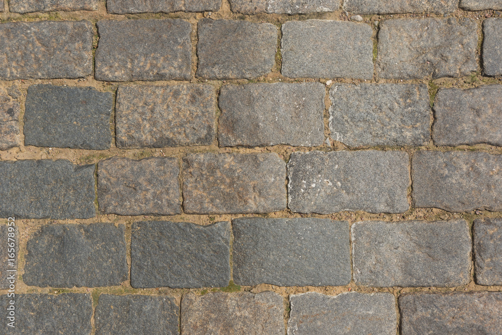 Olden cobblestone pavement close up Olden cobblestone pavement close up