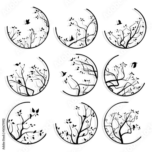 Abstract round icons framed tree branches and flock of birds.