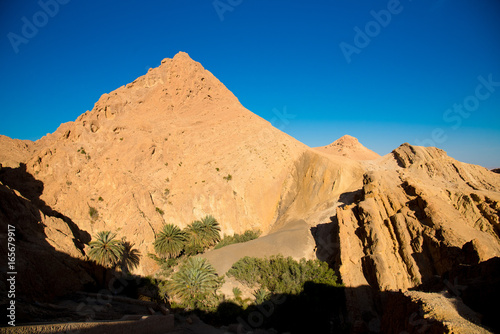 Sahara desert hills, valley and sky photo