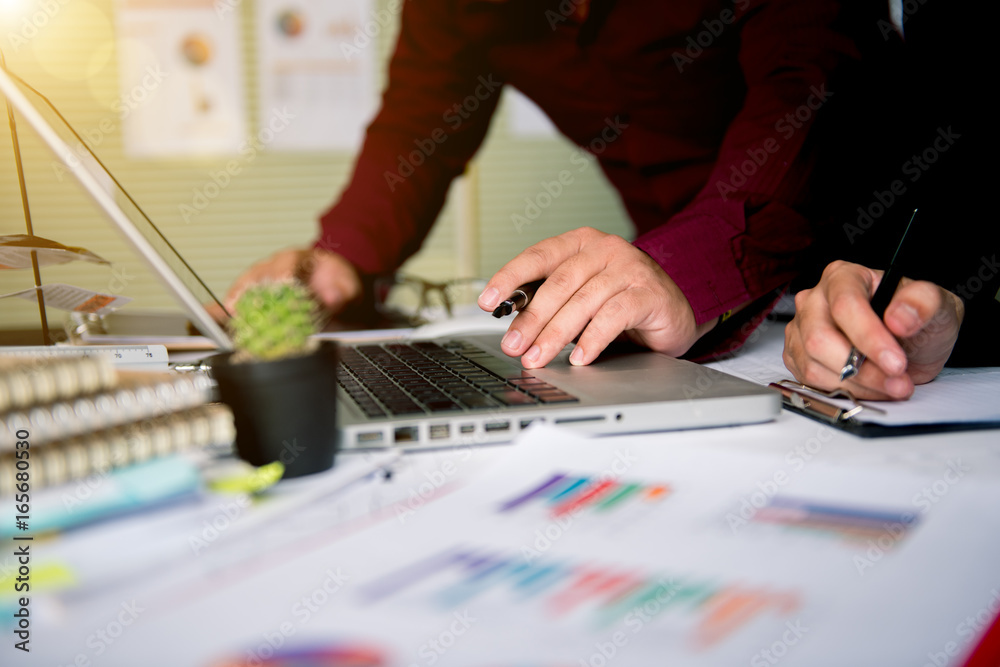 Business team meeting. Photo professional investor working new start up project. Finance task.Digital tablet docking keyboard laptop computer Business team meeting. Photo professional investor working new start up project. Finance task.Digital tablet docking keyboard laptop computer