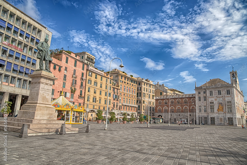 Fototapeta premium GENOA (GENOVA), JULY 19, 2017 - View of Caricamento square, important place near the ancient port (porto antico) of Genoa, Italy