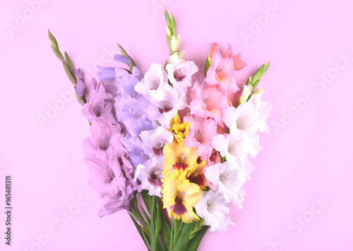Fragrant perfume with beautiful gladiolus flowers.