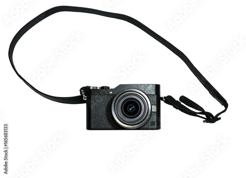 Black mirrorless camera with lens on white isolate