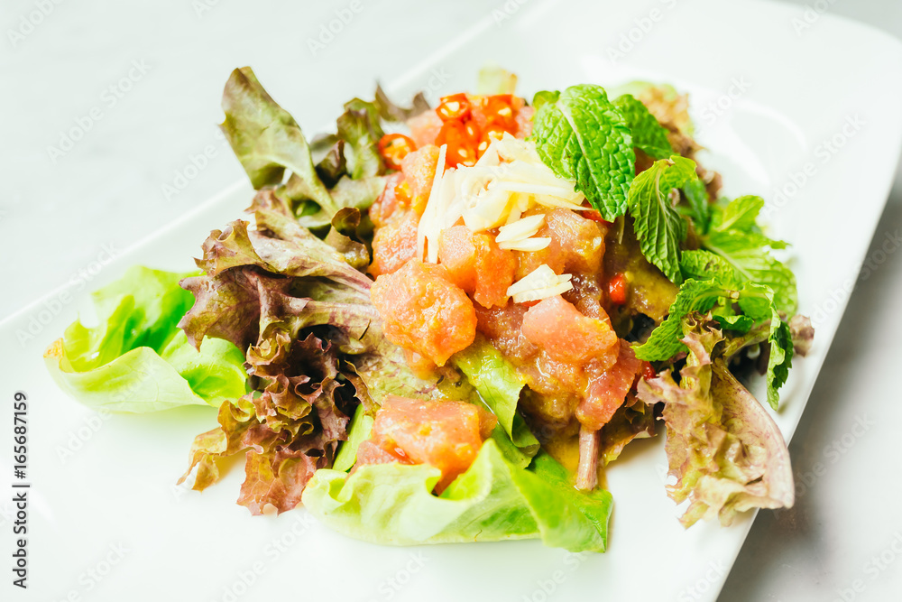 Raw tuna meat salad with spicy sauce Raw tuna meat salad with spicy sauce