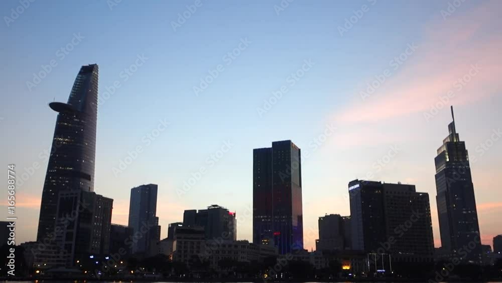 HO CHI MINH CITY - March 12 2017: Skyscrapers business center in Ho Chi Minh City on Vietnam Saigon in sunset HO CHI MINH CITY - March 12 2017: Skyscrapers business center in Ho Chi Minh City on Vietnam Saigon in sunset