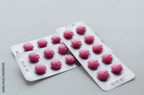 Packings of pills and capsules of medicines photo