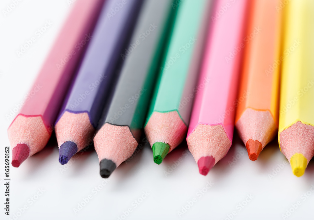 Color pencils isolated on white background. Many different colored pencils. Colored drawing pencils in a variety of colors Color pencils isolated on white background. Many different colored pencils. Colored drawing pencils in a variety of colors