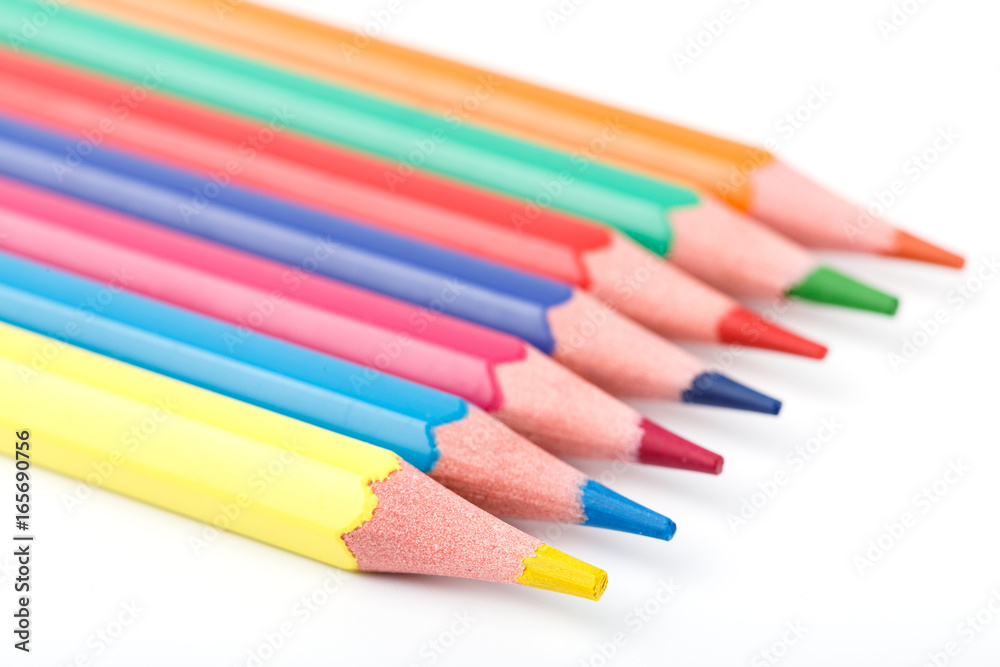 Color pencils isolated on white background. Many different colored pencils. Colored drawing pencils in a variety of colors Color pencils isolated on white background. Many different colored pencils. Colored drawing pencils in a variety of colors