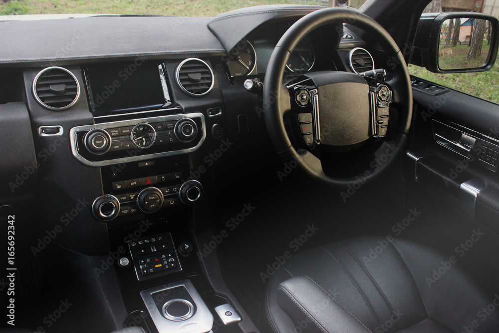 Naklejka premium View of the interior of a modern automobile showing the dashboard