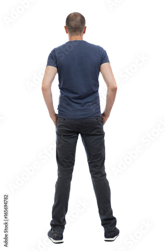 Back view of man in trousers. Standing young guy. Rear view people collection. backside view of person. Isolated over white background.