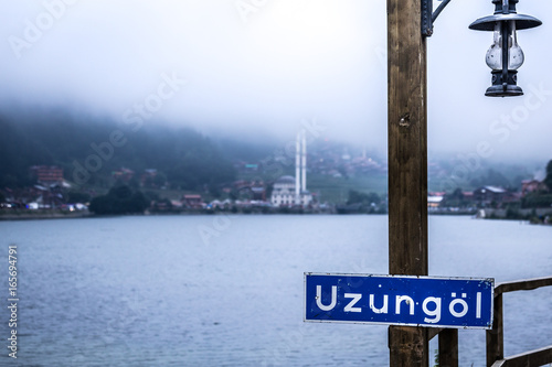 Uzungol(Long Lake):One of the most beautiful tourist places in Turkey.The mountain valley with a trout lake and a small village in Trabzon,Turkey. photo