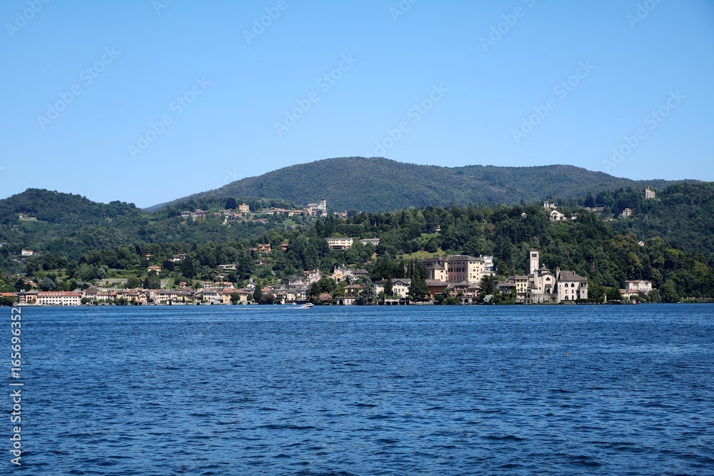 View from Lake Orta to Orta San Giulio in summer, Piedmont Italy 