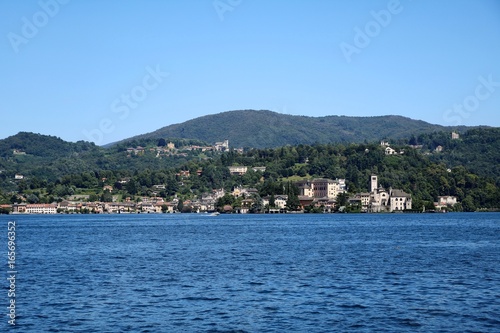 View from Lake Orta to Orta San Giulio in summer, Piedmont Italy 