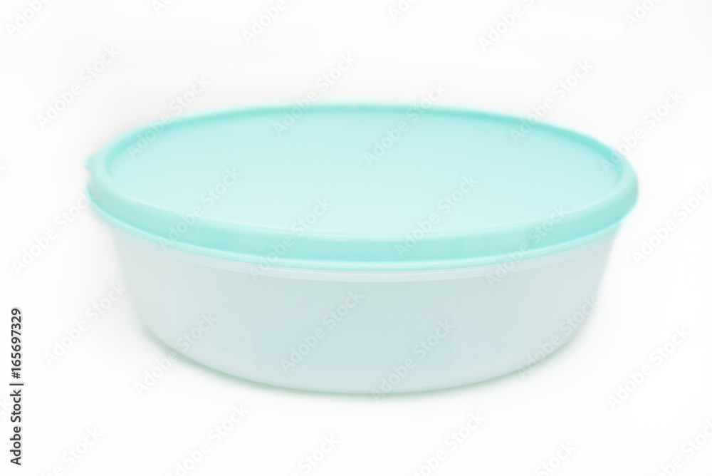 Plastic food container with blue lid isolated Plastic food container with blue lid isolated