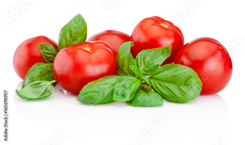 Fresh tomatoes with basil isolated on white background