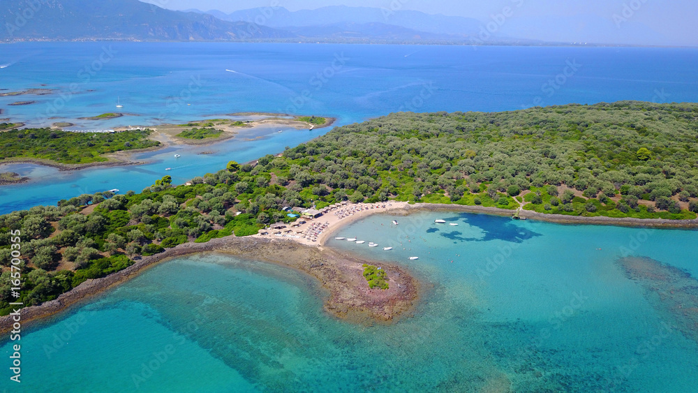Aerial drone photo of Monolia island exotic beach with sapphire and turquoise clear waters, called the 