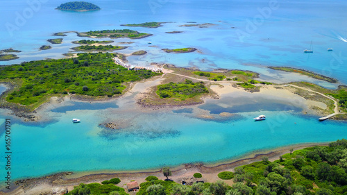 Aerial drone photo of exotic beaches with sapphire and turquoise clear waters, called the "Seychelles" of Greece, Lihadonisia island complex, North Evoia gulf, Greece